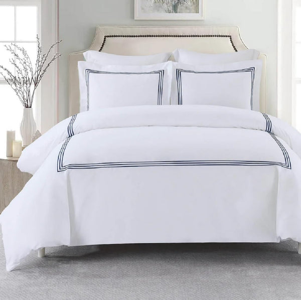 DWR percale duvet cover with ties, king/California king size. Made from crisp and breathable fabric, featuring corner ties to secure the duvet in place. Ideal for adding comfort and a sleek, minimalist look to your bedroom.