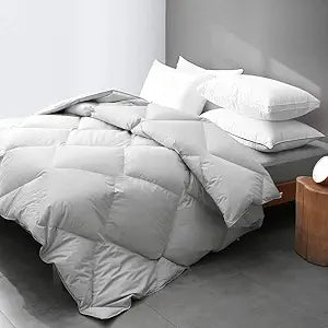 DWR linen duvet cover with ties, king/California king size. Crafted from natural linen fabric, featuring corner ties to keep the duvet securely in place. Offers a relaxed, textured look and breathable comfort for a stylish and cozy bedroom.