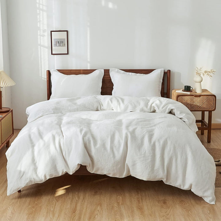 DWR linen standard shams, set of 2, in white. Crafted from natural linen fabric, these shams offer a crisp and clean look with a soft, breathable texture. Ideal for adding a touch of elegance and comfort to your bedding.