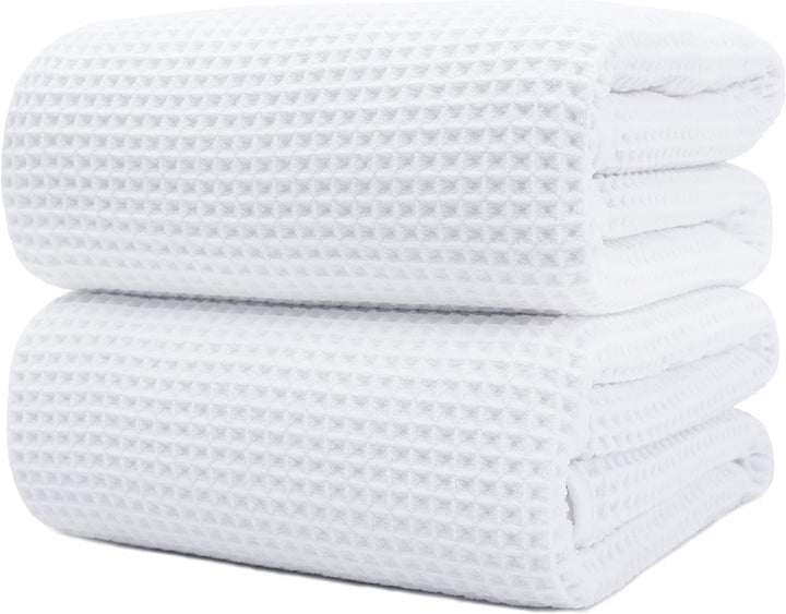 DWR Waffle Towel in White, featuring a textured waffle weave design. This towel offers a sophisticated look with excellent absorbency and a soft, breathable feel, perfect for adding a touch of elegance to your bathroom