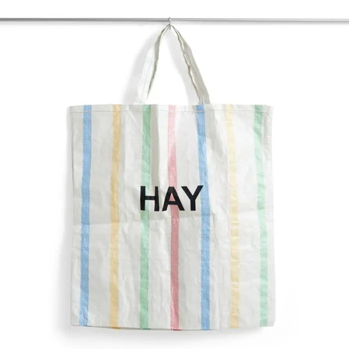 Candy stripe bag with a vibrant, colorful striped pattern. Stylish and versatile design, perfect for everyday use or as a fun accessory. Features durable material and practical dimensions for carrying essentials