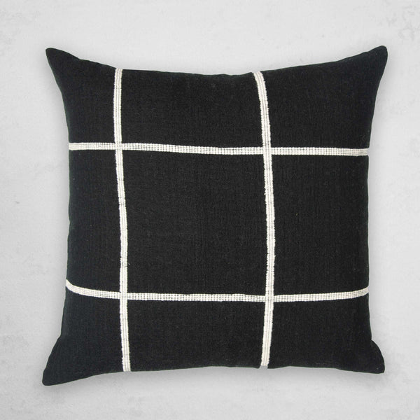 Argo pillow in onyx. Features a sleek and modern design with a deep, rich black color. Made from high-quality materials for a stylish and comfortable addition to sofas, chairs, or beds.