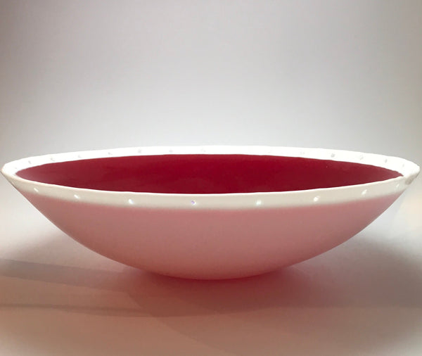 Red Moon large bowls with a vibrant red finish. Elegant and versatile design, ideal for serving or displaying. Perfect for adding a bold color statement to dining tables or decorative settings.