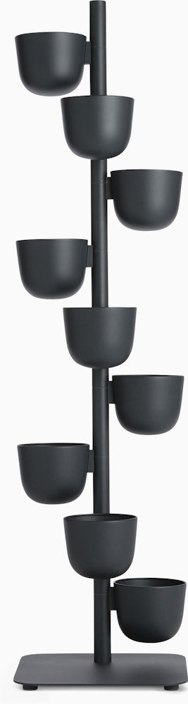 Story 9-piece planter set including bowls and base components. Versatile and modern design with multiple bowls for displaying various plants, and a base for organized arrangement. Ideal for adding a stylish touch to indoor or outdoor spaces.