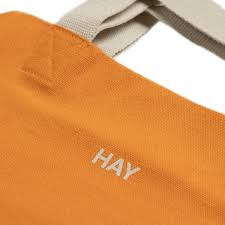 HAY Everyday tote bag. Practical and stylish design with ample space for daily essentials. Features sturdy handles and a versatile look, perfect for carrying items to work, the gym, or running errands.